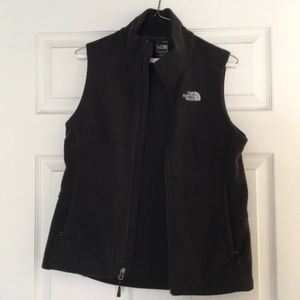 Black North Face fleece zip up vest